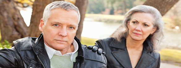 Photograph of a couple looking concerned